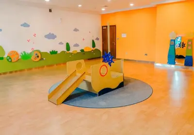a childrens play room with a slide in it at 2 Bedroom Apartment BLVD Central 1 with Boulevard Views in Dubai