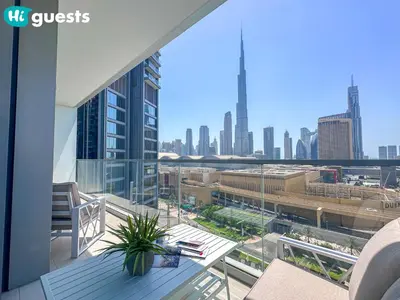a balcony with a view of a city skyline at HiGuests - Wake up to Burj Khalifa views in stunning 2 BR in Dubai