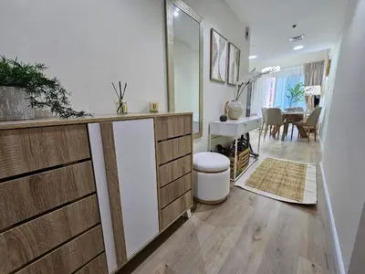 a living room with a counter and a dining room at Luxury 1BR by dubai marina walk! in Dubai