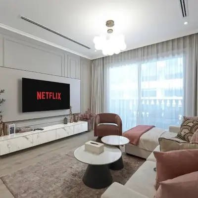Stylish JVC 2BR Stay with Guest Room Rose Gold Accents