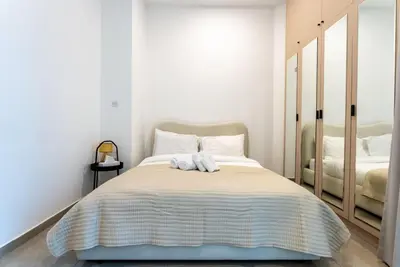 a bedroom with a bed with towels on it at Marina Wharf 1 Bedroom with JBR Beach Views in Dubai