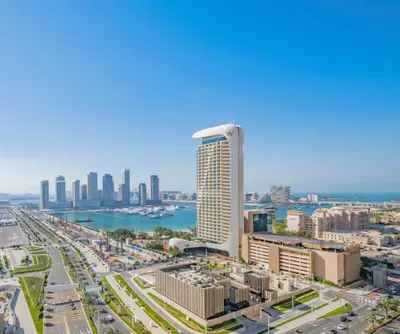a view of a city with a tall building at Duplex Penthouse on 73rd Floor in Dubai Marina in Dubai