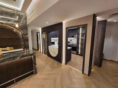 a large room with a kitchen and a living room at Highend 2BR Skyline View with Beach JBR in Dubai