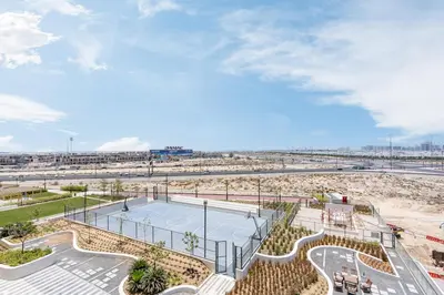 an aerial view of a basketball court at the beach at Contemporary 1BR Home in Damac Hills in Dubai