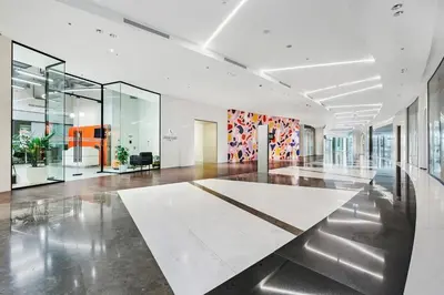an empty room with a large room with glass walls at Stylish 2BR Downtown Dubai with Skyline & Burj Khalifa Views in Dubai