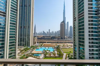 a view of a city with tall buildings at 3BR APT with Burj View from Balcony - Pool and Gym in Dubai
