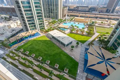 an overhead view of a park in a city at 3BR APT with Burj View from Balcony - Pool and Gym in Dubai