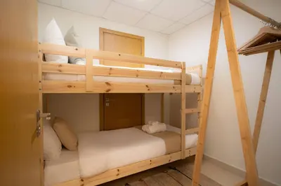 a couple of bunk beds in a room at Elegant 3-Bedroom Apartment - Panoramic Burj Khalifa and Downtown Views in Dubai
