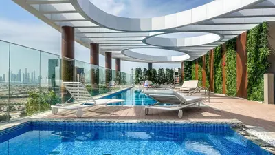 a rendering of a swimming pool on top of a building at Modern Studio in JVC, Rooftop Pool & Gym Access - 10AB08 in Dubai