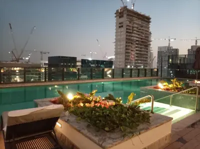 a swimming pool on the roof of a building at Dubai dream in Dubai