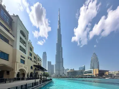 a view of the burj khalifa from the city at Modern Studio Downtown Dubai Luxury & Convenience in Dubai