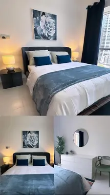 two pictures of a bedroom with a large bed at C Infinity Holiday Homes in Dubai Marina in Dubai