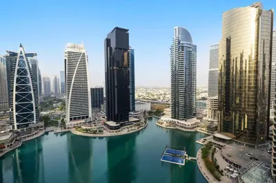 a view of a city with tall buildings at Elegant Haven and Spacious 2BR in Lake Terrace in Dubai