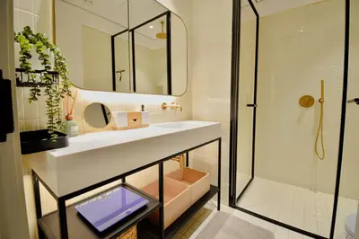 a bathroom with a sink and a shower at Modern Studio at Upside Living, Business Bay with Burj Khalifa View in Dubai