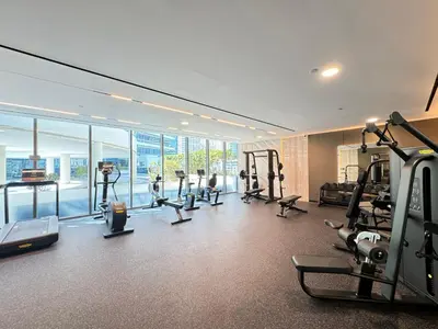 a gym with treadmills and cardio equipment in a building at High-Floor Marina View - Balcony, Pool and Gym in Dubai