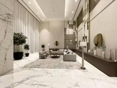 a living room with a marble floor and a lobby at Vogue Creek Harbour, Harbour Views Tower Waterfront Living Close to Downtown, Burj Khalifa and Dubai Mall, One Bedroom Apartment with Balcony and Canal View, Access to all Amenities in Dubai