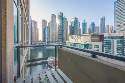 a balcony of a building with a view of a city at Modern 1BR with Balcony and Marina Views in Al Majara 2 in Dubai