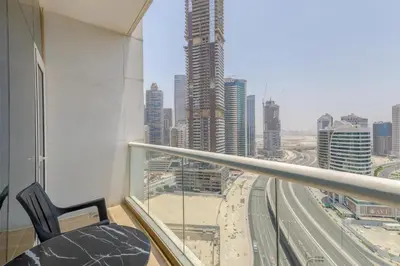 a room with a view of a city skyline at Apartment in Downtown As Dormitory Room for male in Dubai