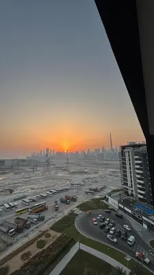 an aerial view of a parking lot with a city at Azizi Riviera 1 A in Dubai
