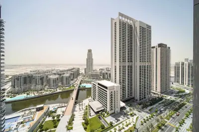 an aerial view of a city with tall buildings at PVH - Creek Gate - Stylish 2BR with Creek View in Dubai