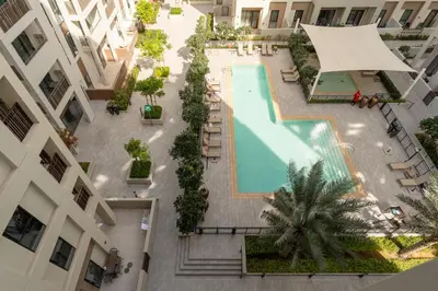 an overhead view of a swimming pool in a building at Maison Privee - Serene Hideaway with Top Facilities in Creek Beach in Dubai