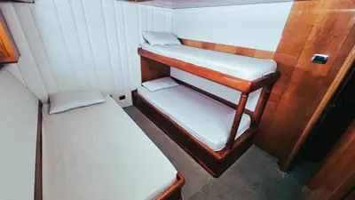 a small room with two bunk beds in it at Riviera Leisure Yachts Dubai in Dubai