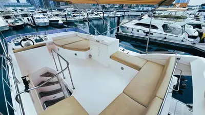 a boat docked in a marina with other boats at Riviera Leisure Yachts Dubai in Dubai