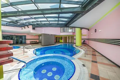 a pool in a building with a swimming pool at EasyGo-Marina Living with View and Amenities in Dubai