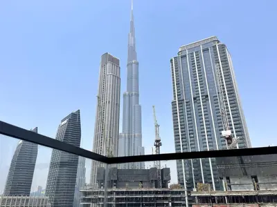 a view of a city skyline with skyscrapers at Prestige stay next to Burj Khalifa in Dubai