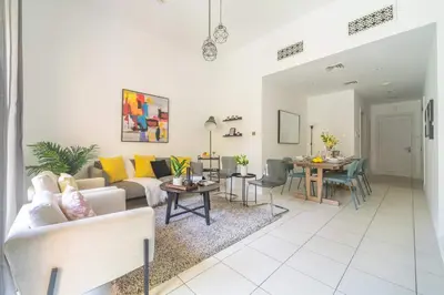 a living room with a couch and a table at Frank Porter - Zaafaran 4, Old town, Downtown Dubai in Dubai