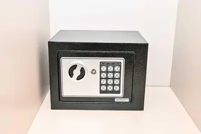 a black and white calculator sitting on a counter at Amazing 2 Bed Burj views in Dubai