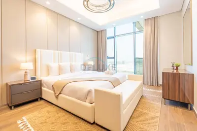 a bedroom with a large bed and a large window at Skyline View 1BR, Minutes Away from Downtown and Dubai Mall, Nobles Tower, Business Bay by Deluxe Holiday Homes in Dubai