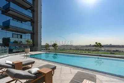 a swimming pool on top of a building at Skyline View 1BR, Minutes Away from Downtown and Dubai Mall, Nobles Tower, Business Bay by Deluxe Holiday Homes in Dubai