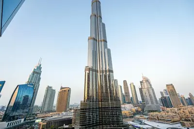 a view of the burj khalifa tallest building in the world at Venetian - Signature 3BR with Burj Khalifa & Fountain views in Dubai