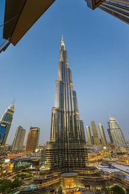 a view of the burj khalifa skyscraper at Venetian - Signature 3BR with Burj Khalifa & Fountain views in Dubai
