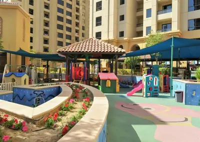 a playground at a resort with a slide at High-Floor 1BR New Design Steps to JBR Beach in Dubai