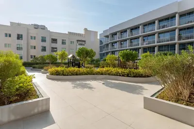 an empty courtyard in front of a building at GuestReady - Rooftop Pool l Garden l Nice Balcony in Dubai