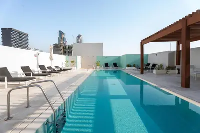a swimming pool on the roof of a building at GuestReady - Rooftop Pool l Garden l Nice Balcony in Dubai