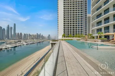 a view of a river in a city with buildings at Romantic basic apertmen in Dubai
