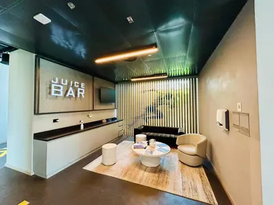 a bathroom with a bar sign on the wall at SUNRISE HOMES - Stylish 1-BR with Incredible Views - Creekside in Dubai