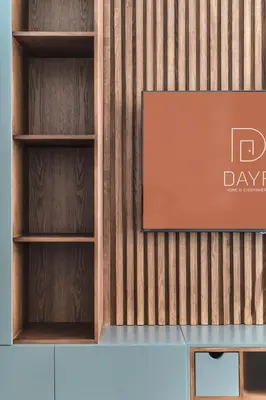 a sign on a wall with wooden shelves at DAYF-SER08 Brand New Studio with Balcony in JVC in Dubai