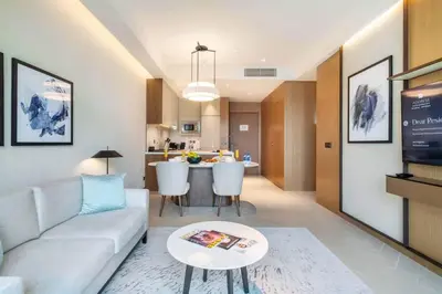 a living room with a couch and a table at Address Opera - Ultra luxurious 2BDR in Downtown in Dubai