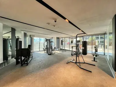a gym with several exercise equipment in a room at Luxury 2BDR Apartment with Private Balcony in Dubai