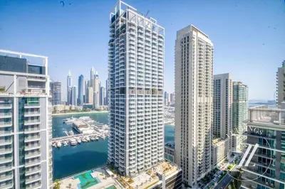 an aerial view of a city with tall buildings at Grand Bleu Tower 2 - 1 BDR with Beachfront Views in Dubai