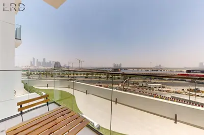 a bench in a building with a train station at Modern 1BR with Canal View in Dubai
