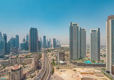 an aerial view of a city with tall buildings at Fashion Avenue Dubai Mall in Dubai