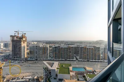 a view of a city from a building at Bookable - 2 Bedroom Sobha Waves, Sobha Hartland in Dubai