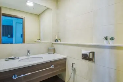 a bathroom with a sink and a mirror at GuestReady - Sea view retreat overlooking The Palm in Dubai