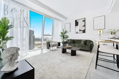 a living room with a couch and a table at Remarkable one BR in Business Bay with Canal View in Dubai