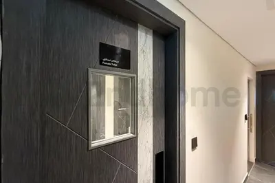 a wooden door with a window in a room at Luxury at Its Finest, 2BR with Private Indoor Pool in Dubai